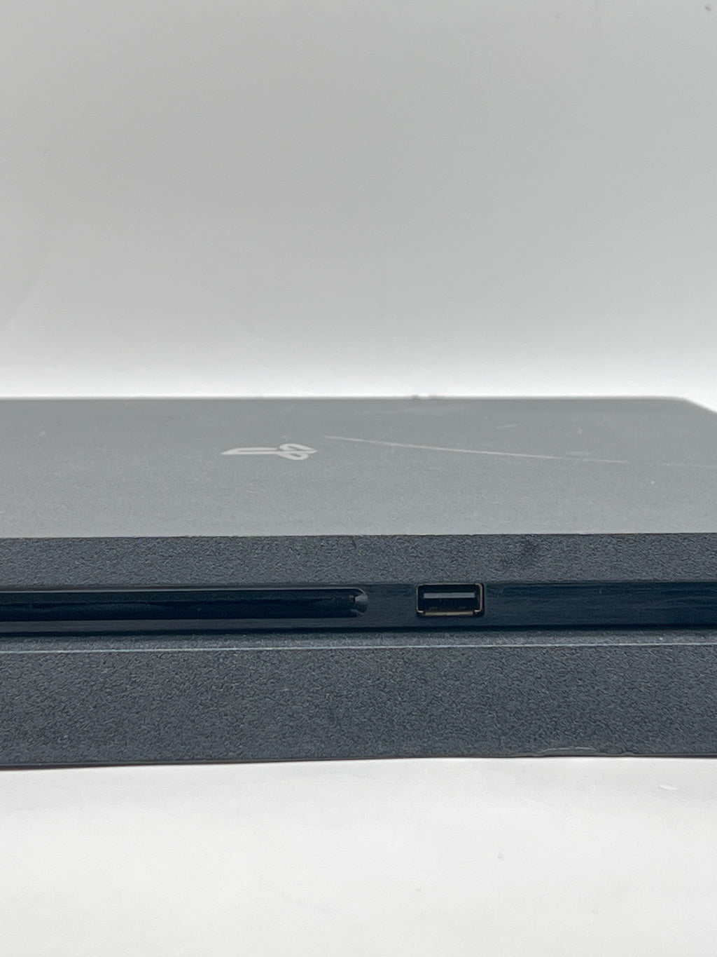 Sony PlayStation 4 Slim 1TB Home Console Black - Used with 2 Controllers