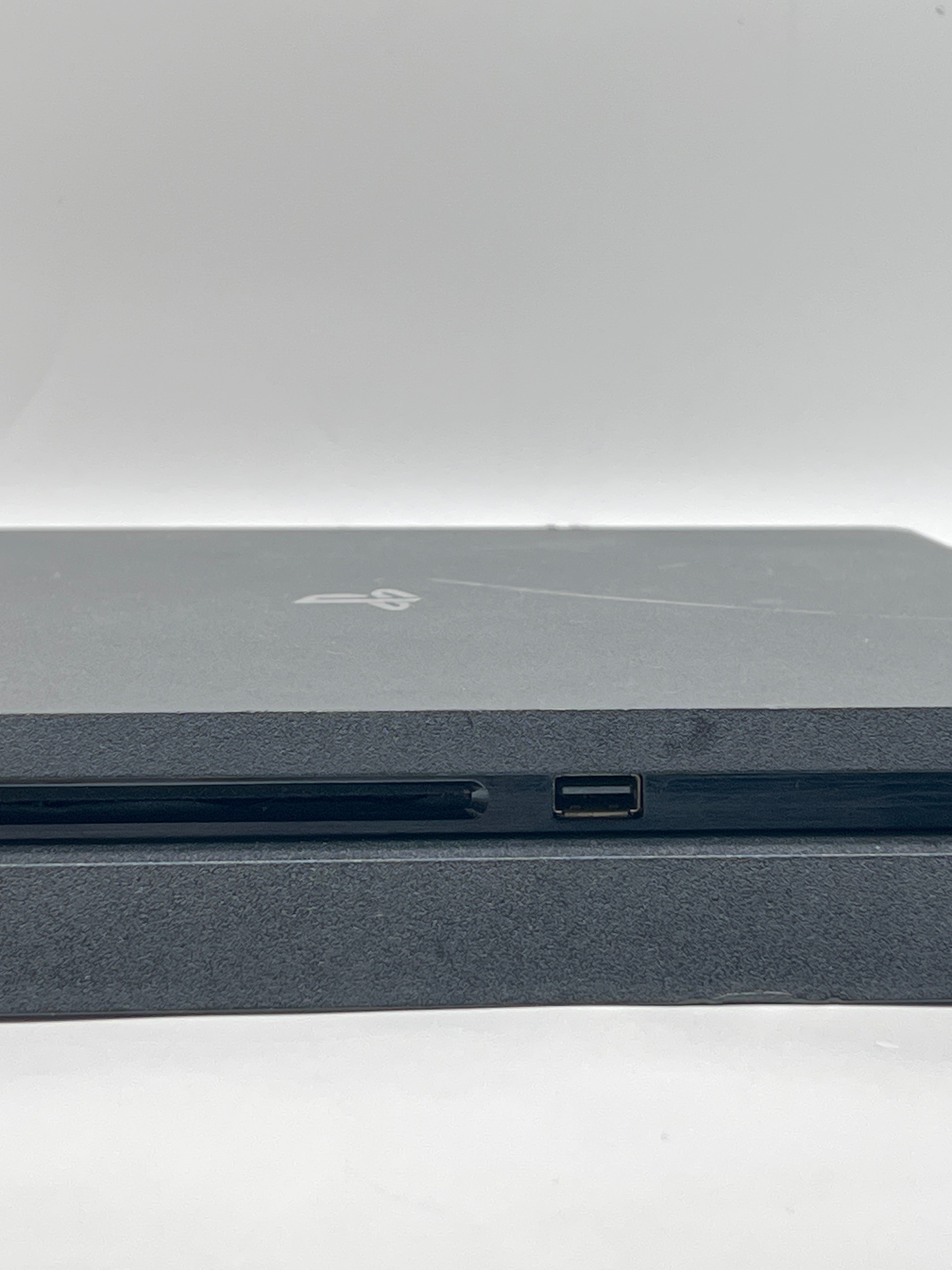 Sony PlayStation 4 Slim 1TB Home Console Black - Used with 2 Controllers