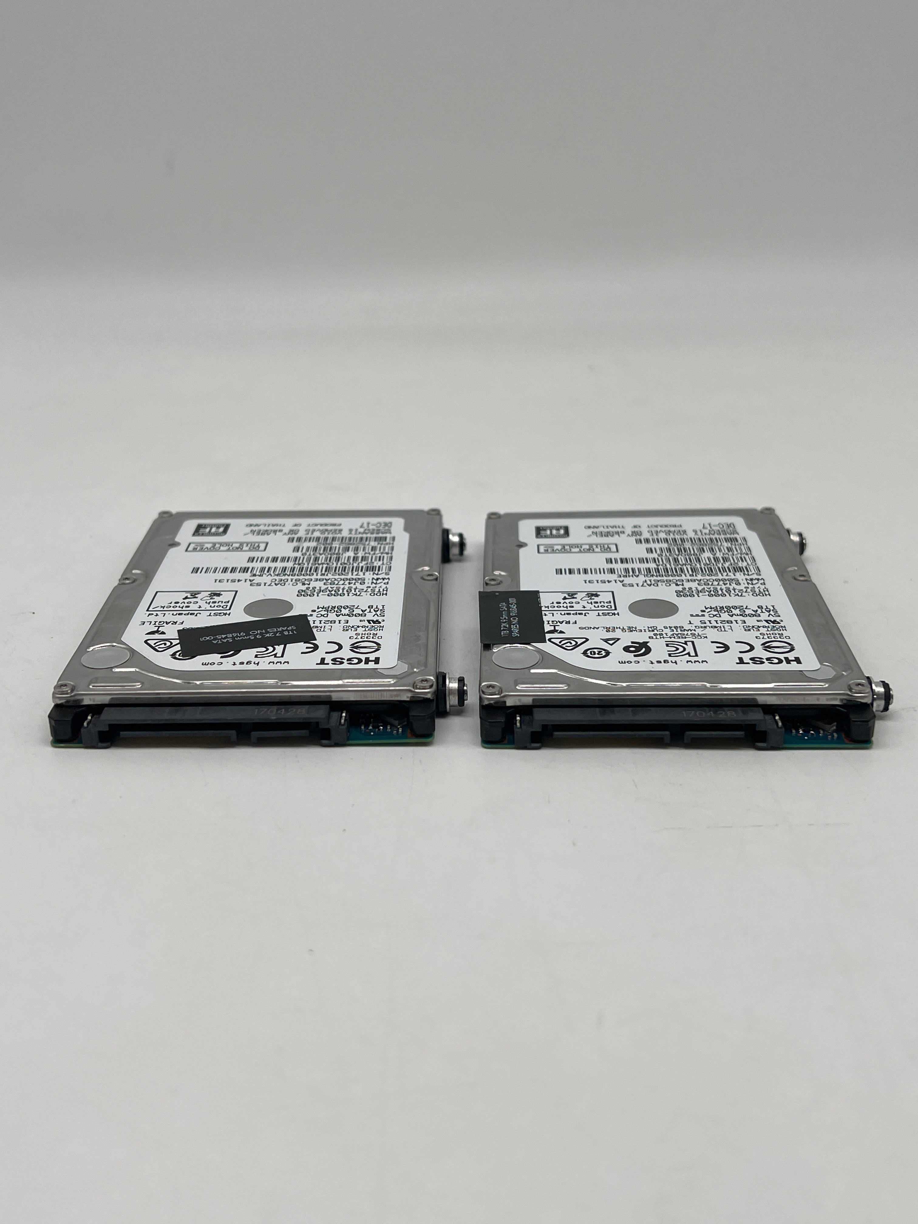 (lot of 2) HGST 1 TB 7K1000 HTS721010A9E630 2.5" SATA III Hard Drive