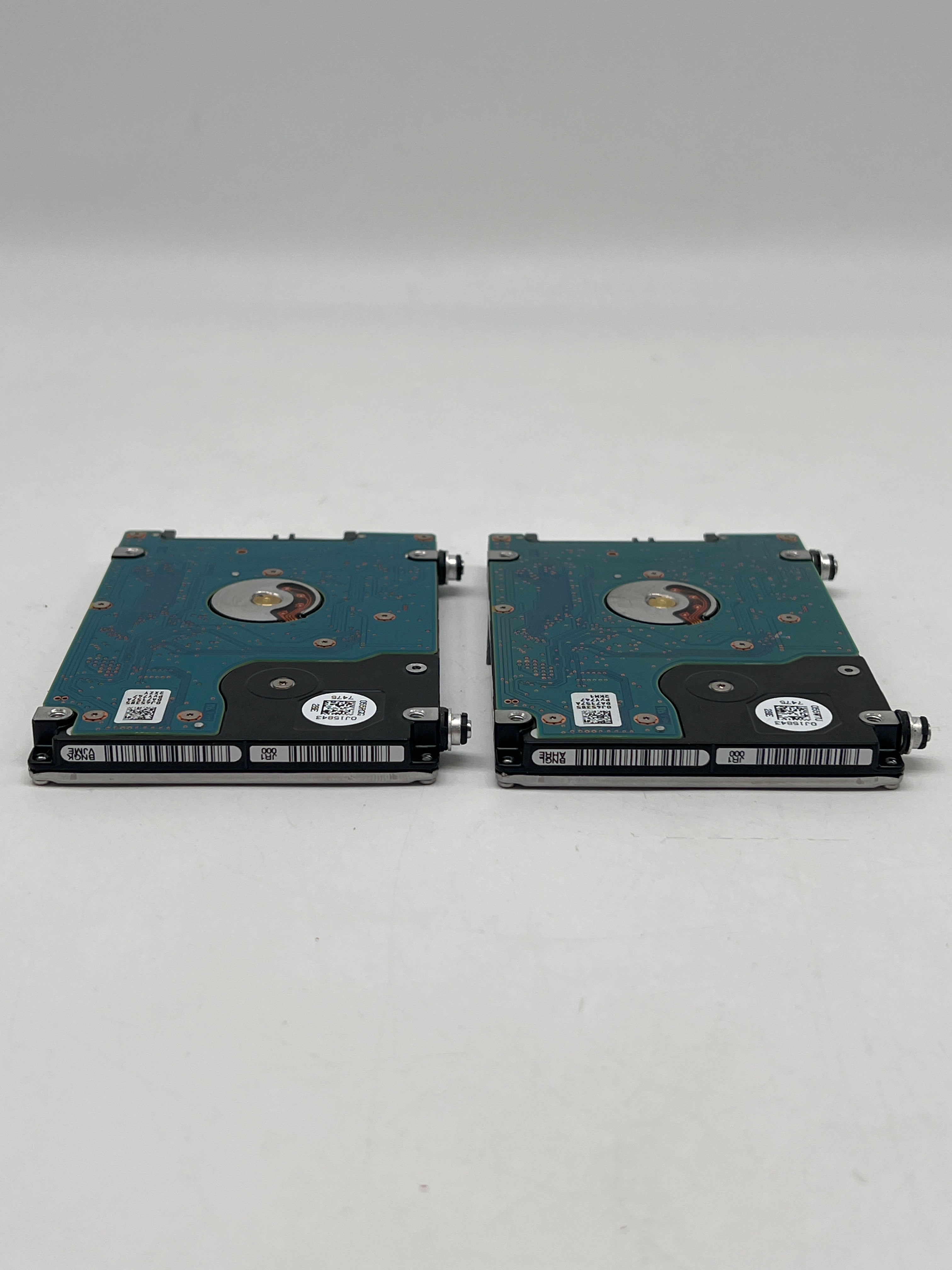 (lot of 2) HGST 1 TB 7K1000 HTS721010A9E630 2.5" SATA III Hard Drive