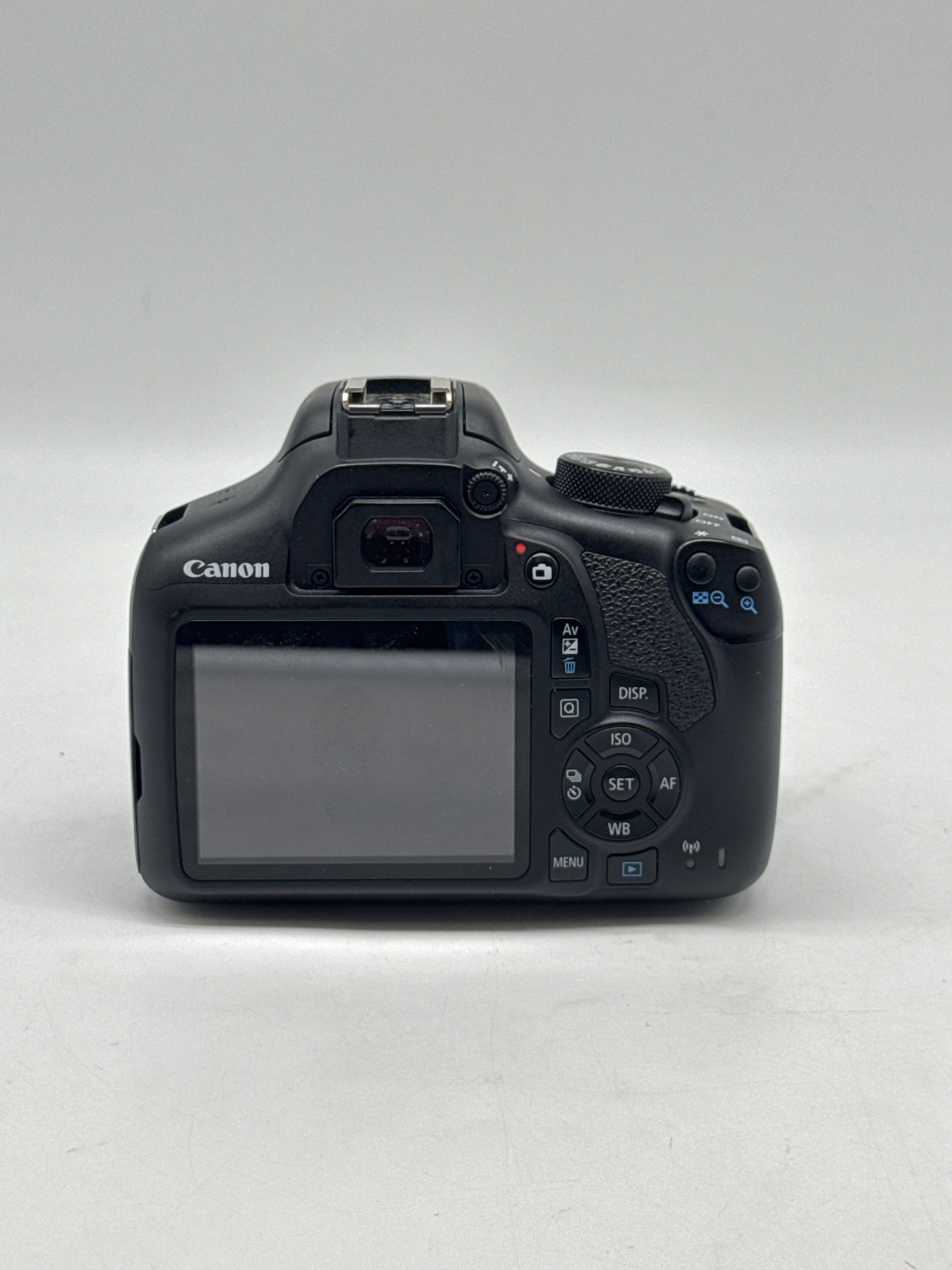 Canon EOS Rebel T6 18.0 MP DSLR Camera W/ Canon Len EF-S 18-55mm f/3.5-5.6 IS II and 2 Charging docks.