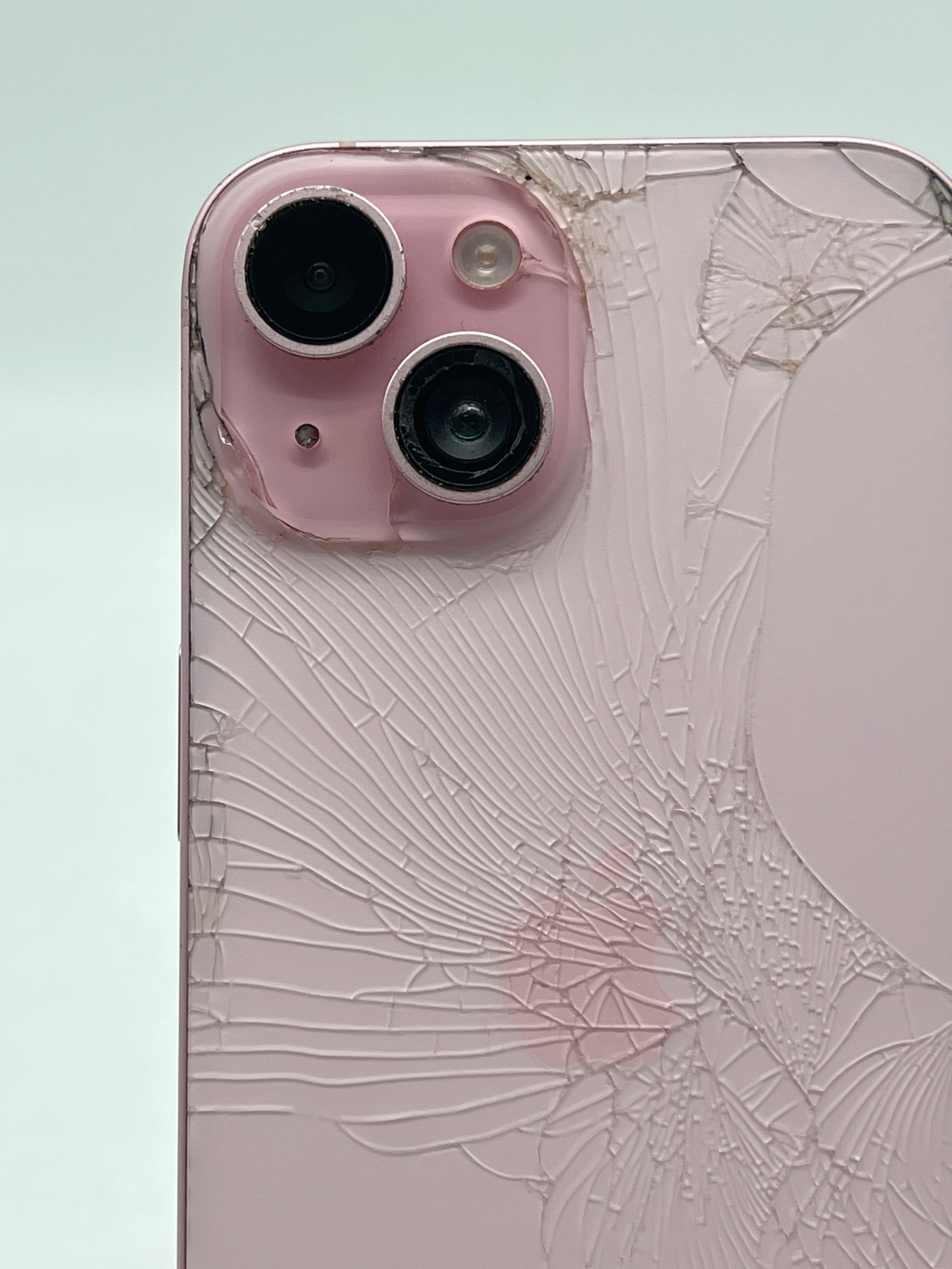Apple iPhone 15 128GB T-Mobile Pink front, back and camera lens cracked