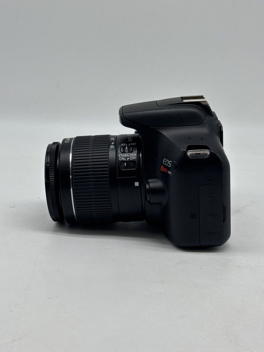 Canon EOS Rebel T6 18.0 MP DSLR Camera W/ Canon Len EF-S 18-55mm f/3.5-5.6 IS II and 2 Charging docks.