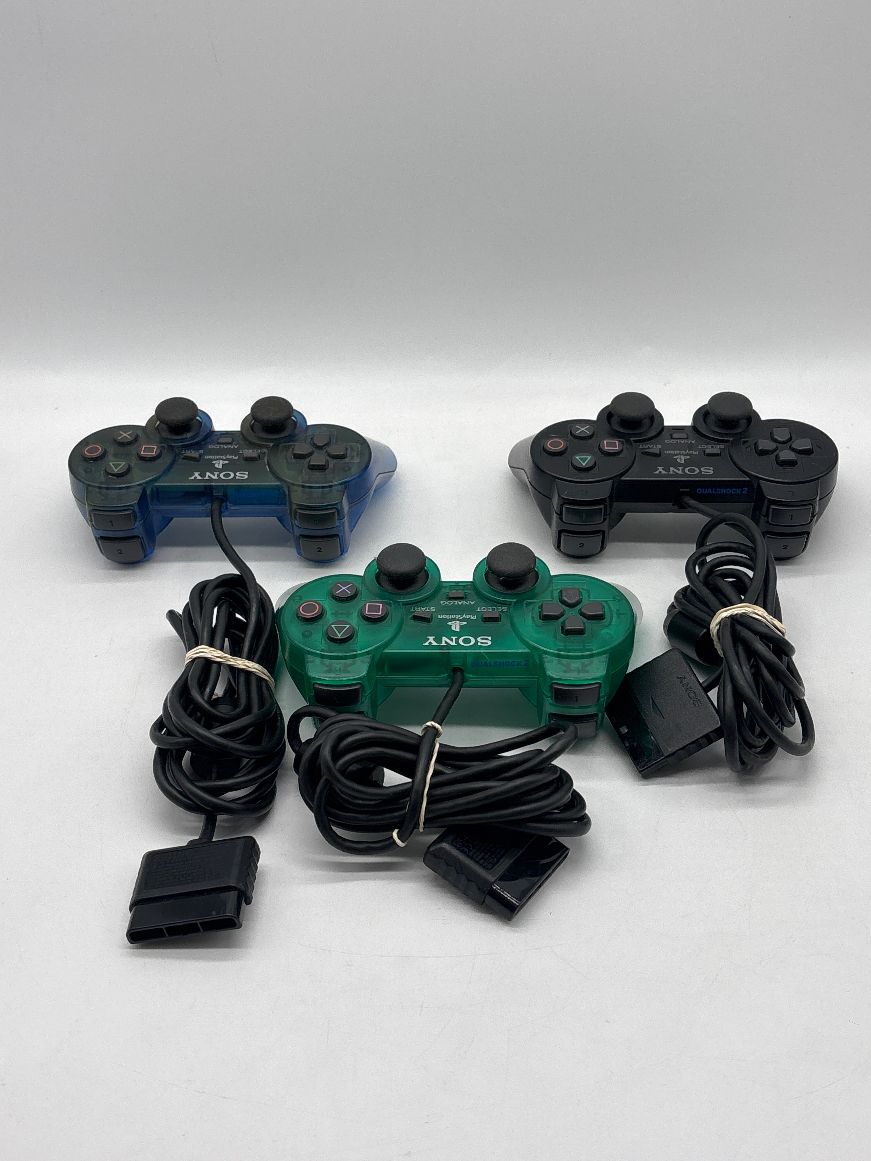 Sony PlayStation 2 Slim (SCPH-77001) + Cables + 2 8GB Storage Cards + 3 Controllers- Used