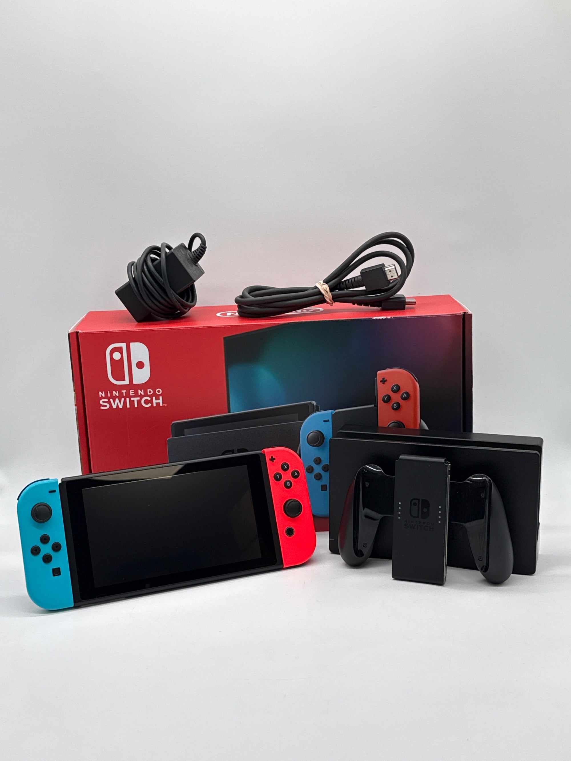 Nintendo Switch V2 HAC-001(-01) w/ Red and Blue Joycons and Games - Used with Box