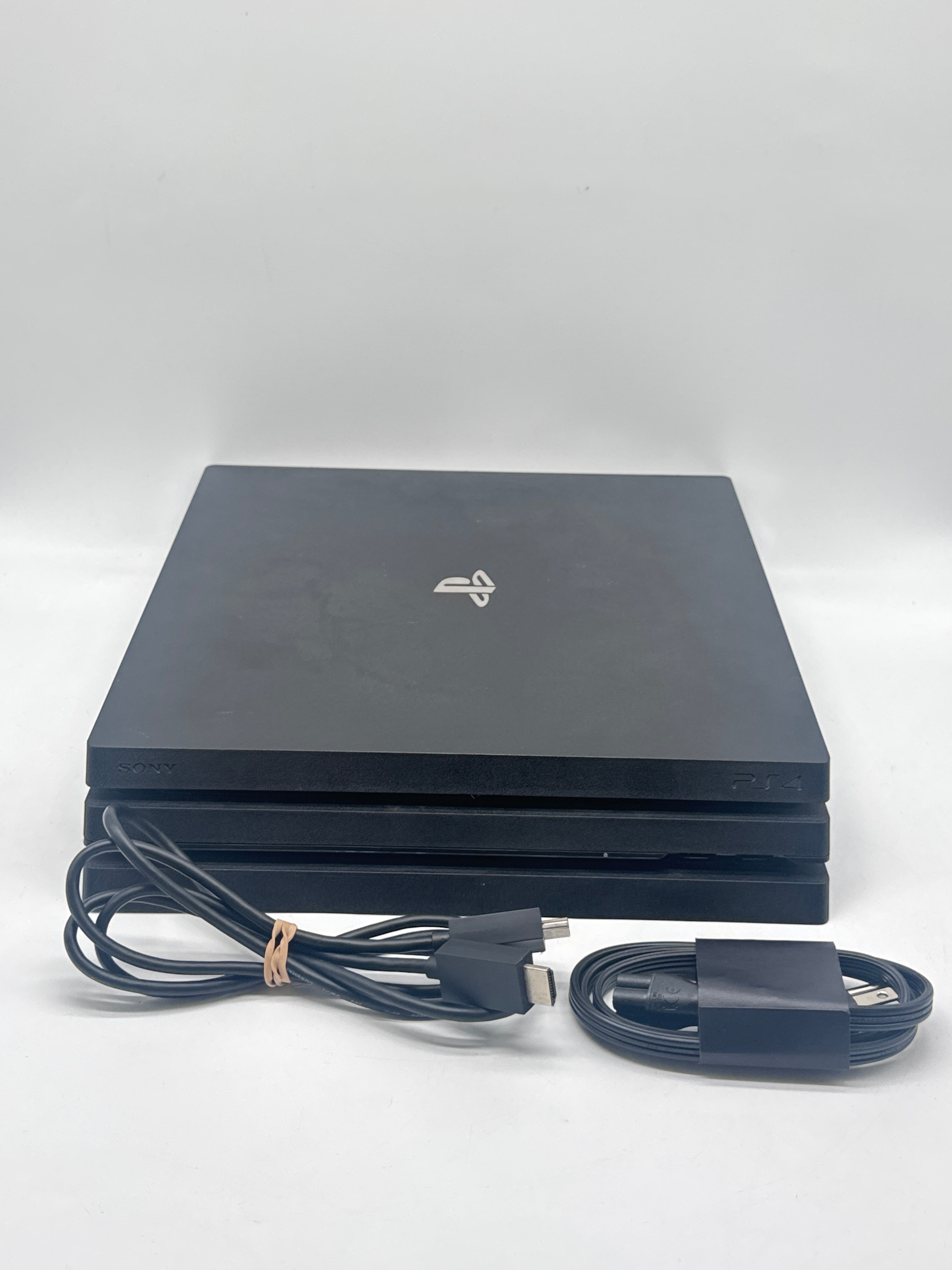Sony PlayStation 4 Pro (CUH-7215B) 1TB Console + Cables - Used (Missing Screws)