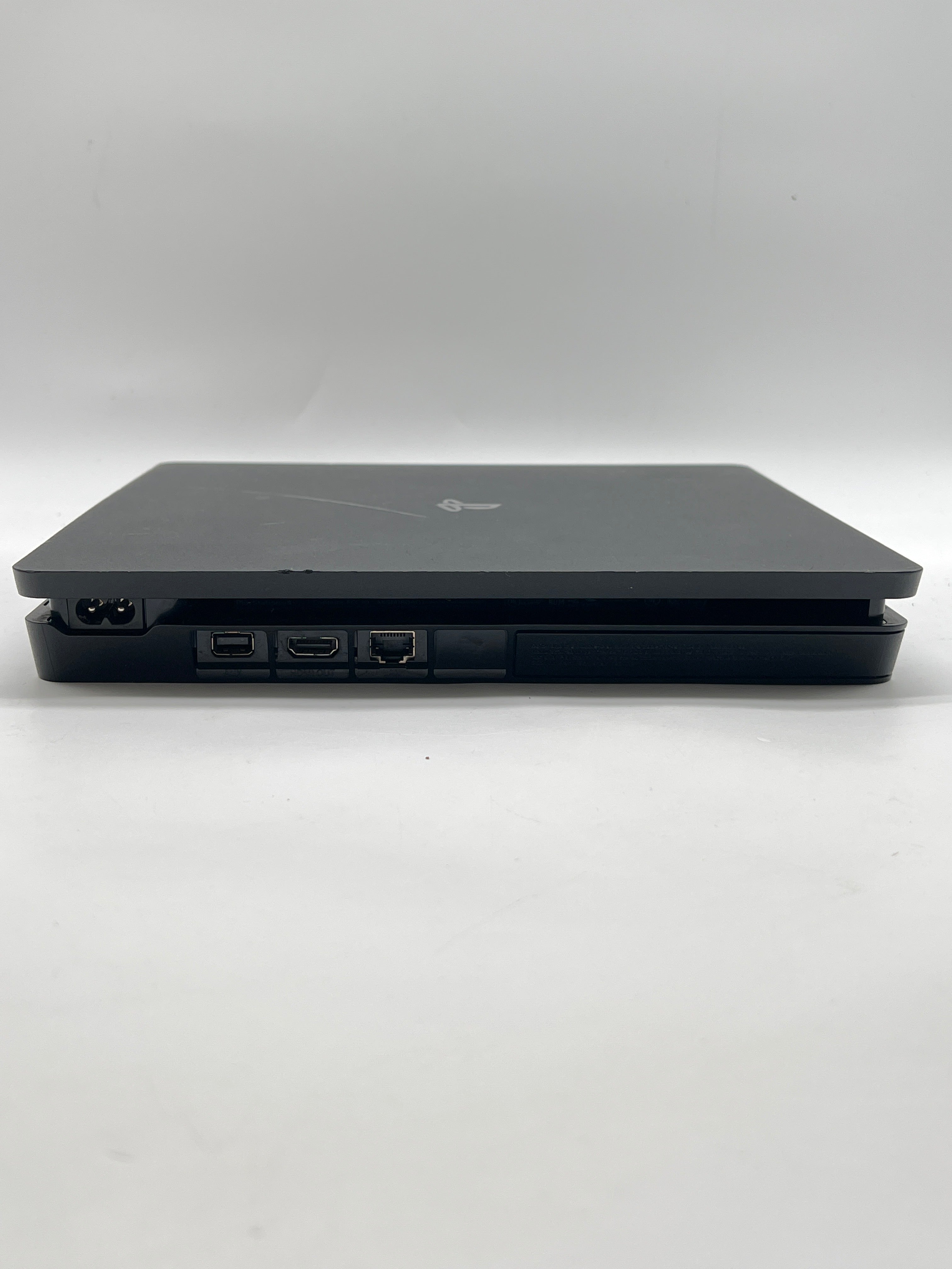 Sony PlayStation 4 Slim 1TB Home Console Black - Used with 2 Controllers