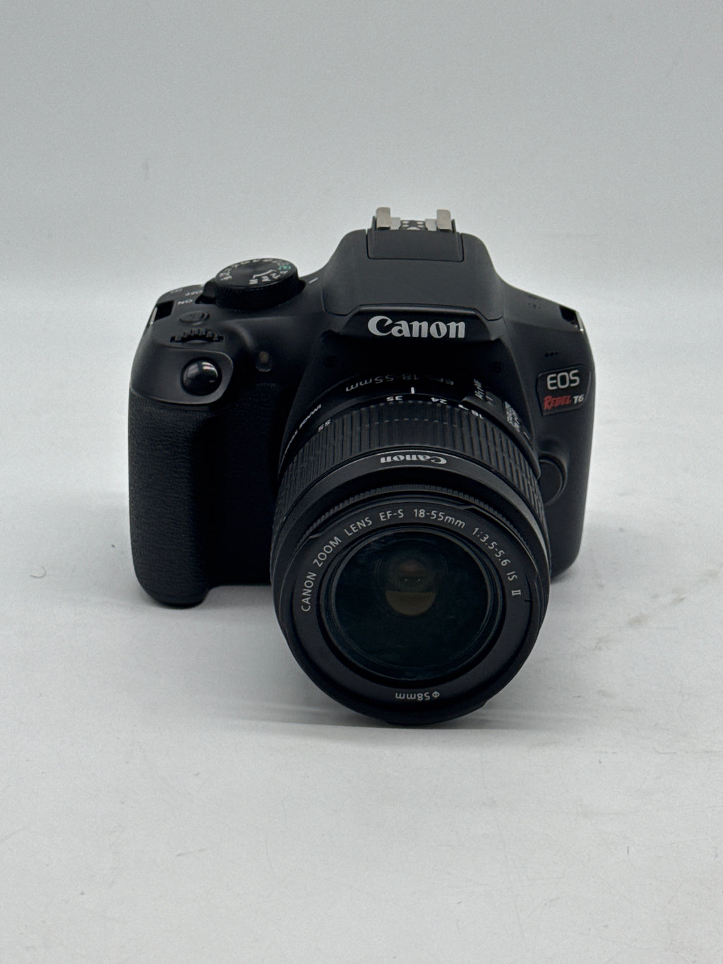 Canon EOS Rebel T6 18.0 MP DSLR Camera W/ Canon Len EF-S 18-55mm f/3.5-5.6 IS II and 2 Charging docks.