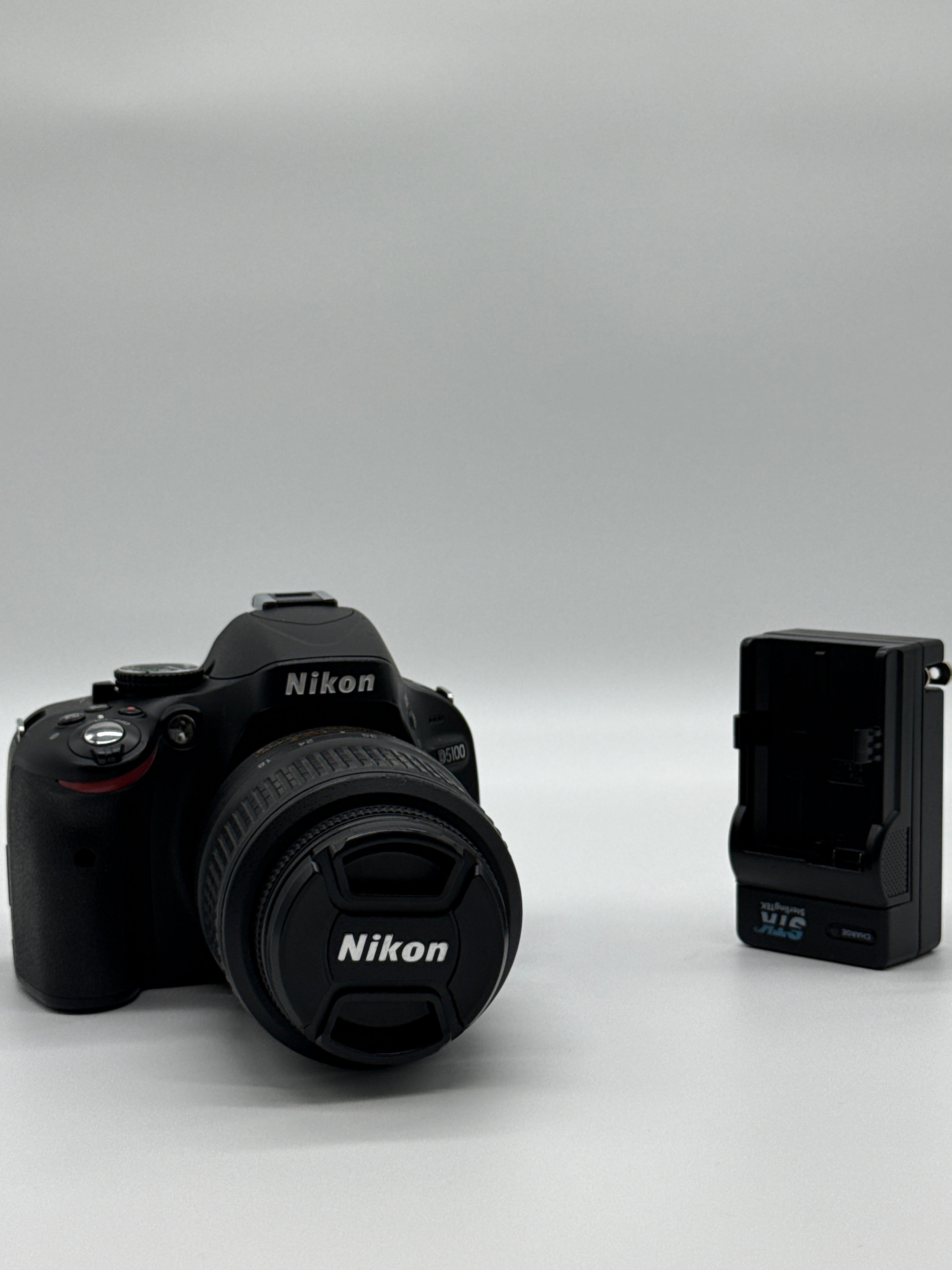 Nikon D5100 DSLR Camera 3.1x Optical Zoom 16.2MP Black with 18-55mm AF-S DX VR Lens